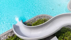 Ilustrasi perosotan kolam renang water park. Bisa gunakan bahan batu alam.